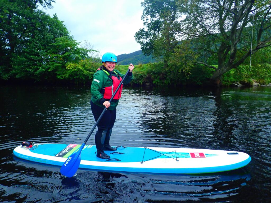 Stand Up Paddleboarding on the river Tay. 